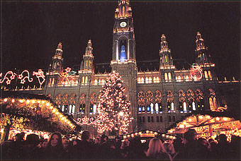 Christmas market in front of the city hall,
 with great and joyfull illumination. Vienna