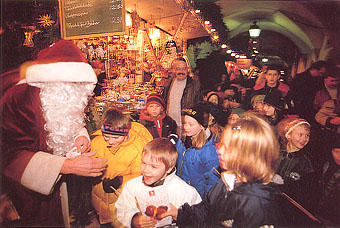 Children are so happy to get cookies from Santa Claus. Rothenburg