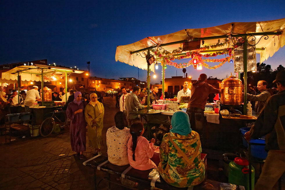 Hungry tourists begin to gather at the stalls in Jemaa el-Fnaa