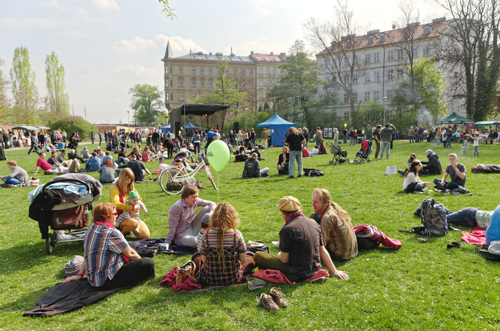 Relaxing on the green grass. It's spring in Praha